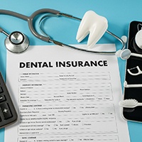 Dental insurance paperwork and calculator