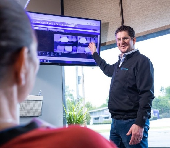 Woman receiving oral cancer screening