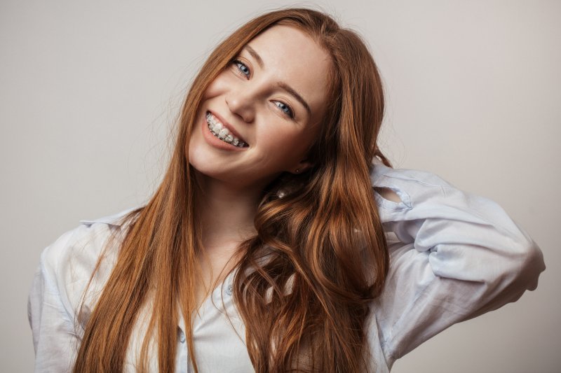 young girl with braces