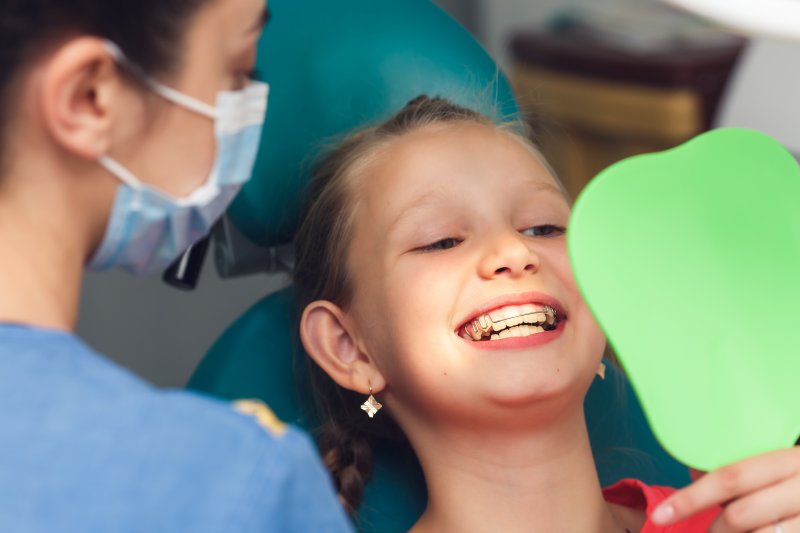 young girl with early orthodontics